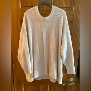 White sweater with deep “v” back